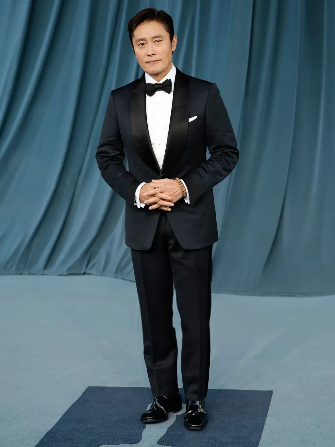 Lee Byung-hun Exudes Front Man Charisma in a Classic Black Tuxedo